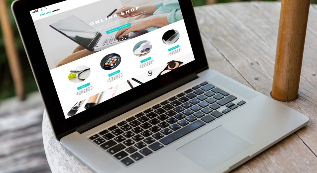 a metallic body laptop showing the web page of an online shop showing the necessaty of web development for every business in today's world